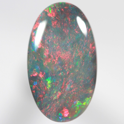 SOLID BLACK OPAL Bright red rolling flashes over green and blue sparkles SEE VIDEO